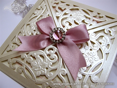 laser cut wedding invitation with brooch